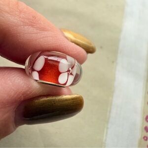 Glass bead charm with Red and White Floral Design
